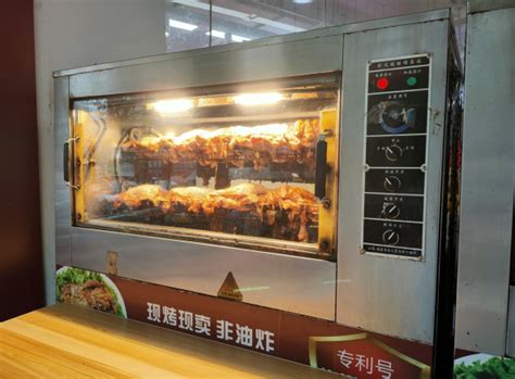 电烤鸡架机器多少钱一台?_张成荣电烤鸡架加盟品牌