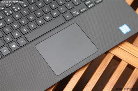 戴尔笔记本电脑键盘背光灯怎么开？