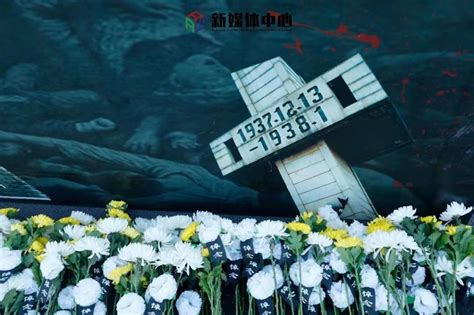 缅怀逝者 祈愿和平 南京大屠杀死难者遗属2021清明祭举行_新华报业网