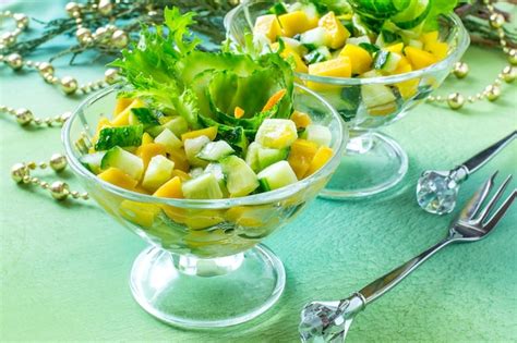 Premium Photo | Festive salad with cucumber and mango