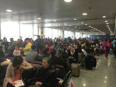 北京受到降雪影响 首都机场三百余航班延误_国内新闻_新闻中心_应急中国网