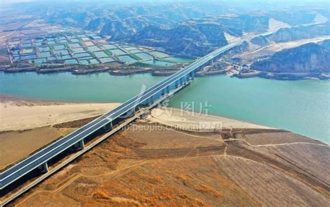 河南焦作：国道207孟州至偃师黄河公路大桥建设进入尾声-人民图片网