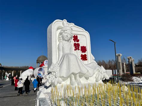 长春近百名停车收费宣导员清雪打“冰溜” 为市民提供方便-中国吉林网