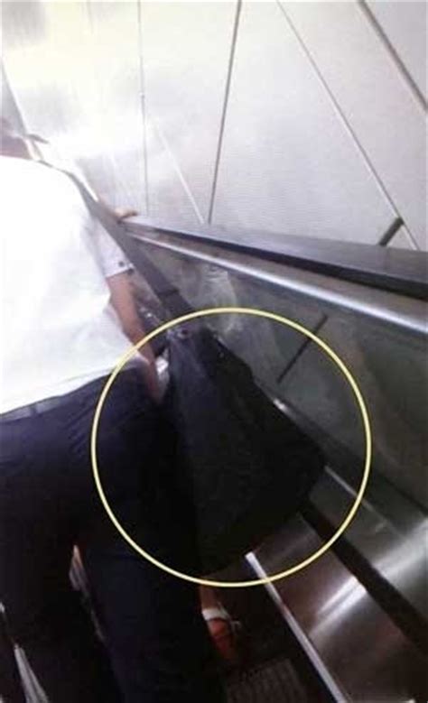 【组图】夏日韩国地铁性犯罪增加 手表钢笔都能偷拍 (2)