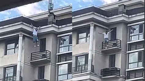 男子悬挂10楼摇晃试图自救，女子救援失败他从楼顶坠落，场面惊险_腾讯视频