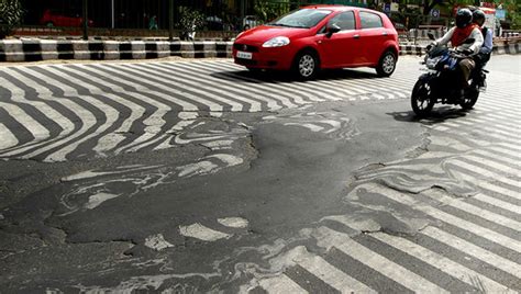 印度极端高温致逾千人死亡 柏油路融化如泥浆(图)_频道_凤凰网