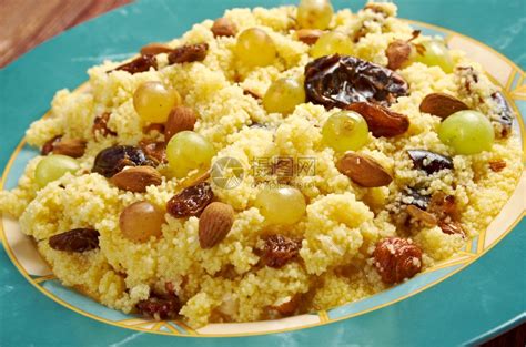 晚餐蜜糖谷物Mesfouf是一道阿尔及利亚和突尼斯菜柑橘蒸粗麦粉沙拉高清图片下载-正版图片307764112-摄图网