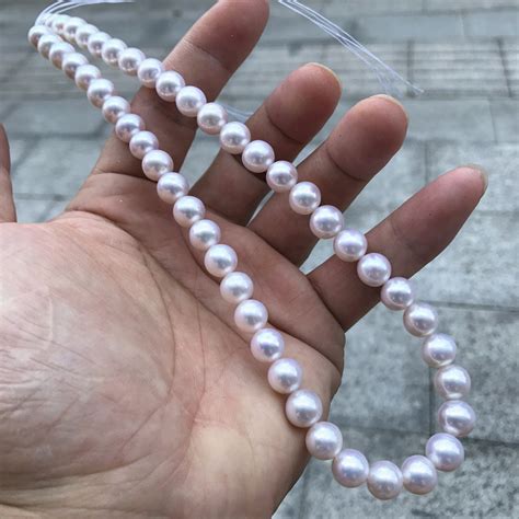 厂家直销淡水珍珠A1AB强光正圆少暇9-10mm珍珠项链批发 柜台礼品-阿里巴巴