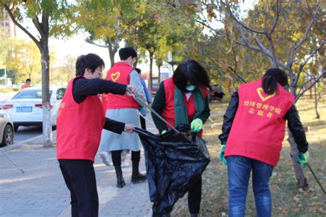 爱护校园环境，共创美丽校园 ——之江公益社志愿者在行动
