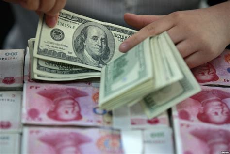 人民币对美元汇率中间价反弹50个基点_ 视频中国