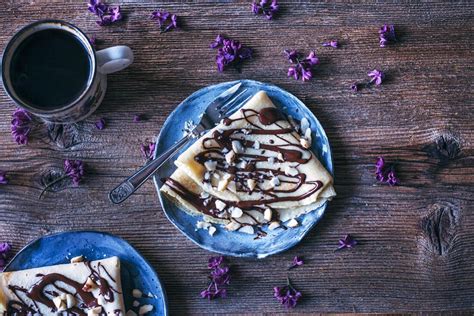 Crepes with dark chocolate drizzle and … – License image – 12338041 ...