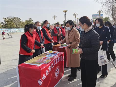 郸城联社组织志愿者参加学雷锋志愿者服务活动_郸城县人民政府