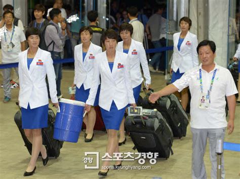 组图：朝鲜亚运代表团首批成员抵韩入住运动员村_平阳新闻网