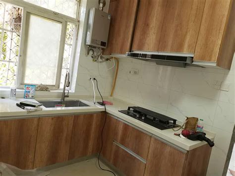厨房橱柜安装维修 上海市松江区洗衣机排水管 共兴镇衣柜打孔安装
