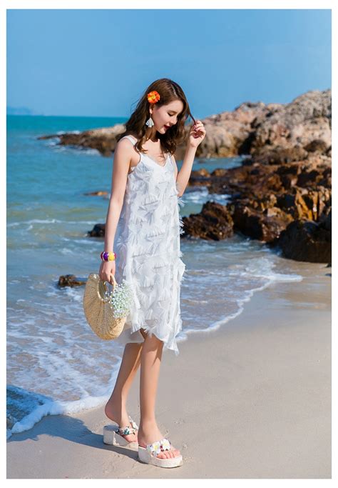 2021旅游穿搭沙滩裙超仙气质绑带露背纯色长裙三亚海边度假连衣裙-阿里巴巴