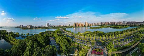 东西湖，蓝天白云下的“湿地花城”_要闻_新闻中心_长江网_cjn.cn