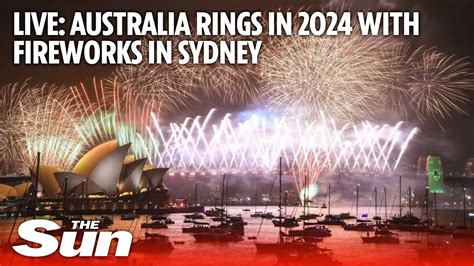 Fireworks explode over the Sydney Opera House and Harbour Bridge during ...