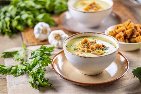 Premium Photo | Garlic cream soup with bread croutons and flavored with ...