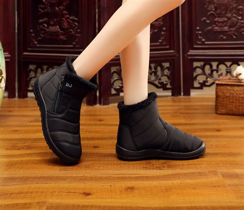 2022新款女士雪地靴冬季保暖中筒靴加绒加厚东北棉鞋跨境大码女鞋-阿里巴巴