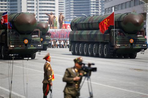 North Korea rolls out new missiles during huge military parade - CBS News