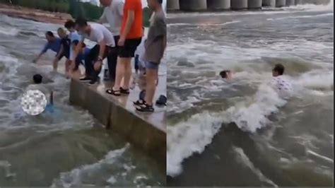 大坝泄洪引围观，男孩坠河被水冲走后不幸溺亡，多人伸手营救未果_腾讯视频