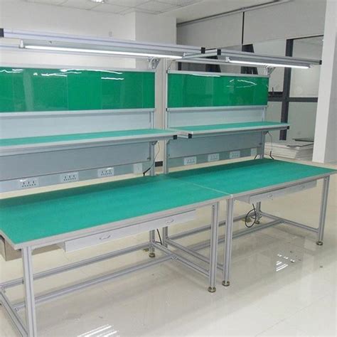 重型车间工作台带挂板钳工工作台天津厂家工位装备吊柜工作桌-阿里巴巴