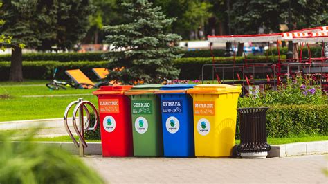 Trash bins with assorted garbage. Recycling of different materials. The ...