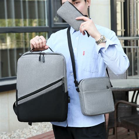 跨境男士背包USB充电大容量牛津布休闲商务简约电脑三件套双肩包-阿里巴巴