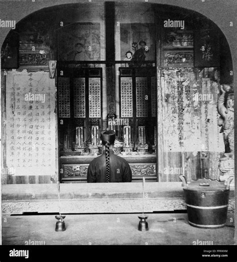 CHINA: FUCHOU, c1905. /nA Chinese man standing in front of ancestral ...