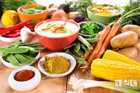 Various soups surrounded by ingredients, Stock Photo, Picture And ...