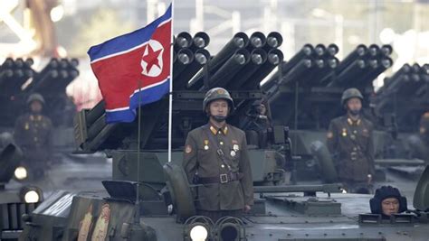 23 三个前北朝鲜游击队员，加入南朝鲜警察后，帽子上仍然别着北朝鲜的星星。他们正在搜捕北朝鲜游击队_新浪图集_新浪网