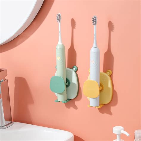 新款电动牙刷置物架轻奢免打孔电动牙刷架子壁挂可爱电动牙刷支架-阿里巴巴