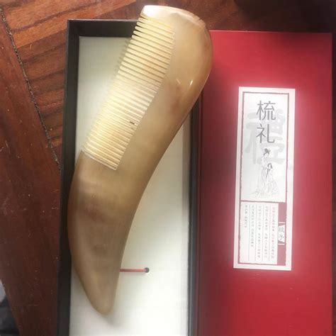 牛角梳真假图片