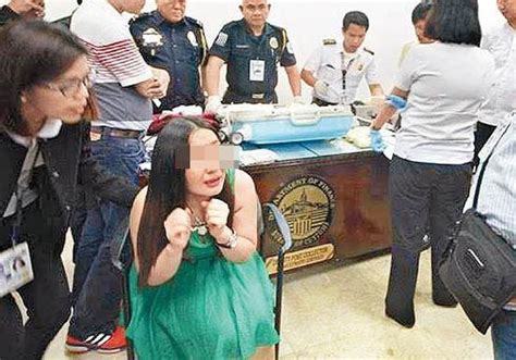 中国女子行李藏毒在菲律宾被捕 吓得泪流满面|藏毒|菲律宾_新浪新闻
