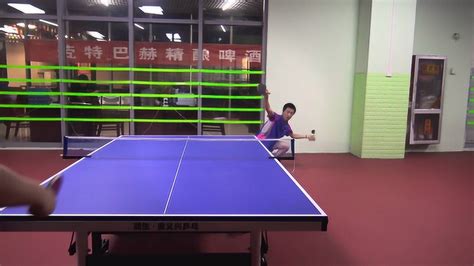 《乒乓球慢动作教学视频》第26集：马龙反手拉下旋接连续快拉
