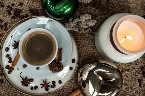Premium Photo | Background composition of a cup of coffee, candles ...