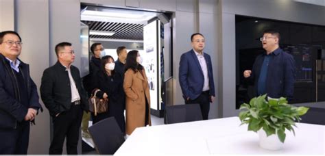 新疆大学党委副书记朱宏一行来访-西安交大智慧党建平台