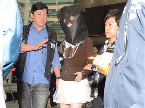 香港水泥藏尸案18岁女嫌犯指认现场_腾讯网触屏版