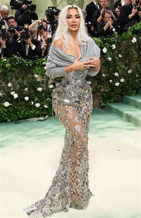 Kim Kardashian Shocks in Tight Corset and Sheer Gown at 2024 Met Gala