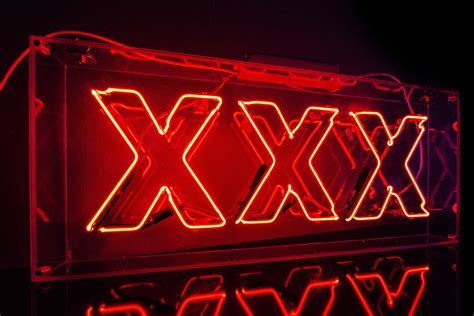 Neon XXX Hire - Kemp London - Bespoke neon signs and prop hire.