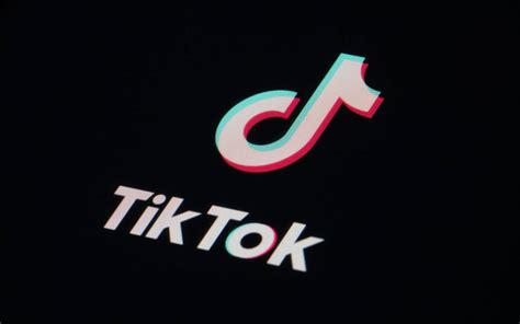Tik Tok App Logo Displayed On A Wooden Desktop Via 3d Rendered ...