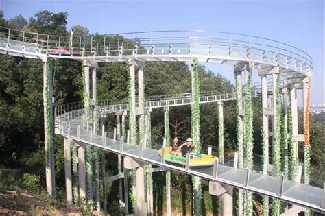 玻璃水滑道-玻璃水滑道-木质吊桥,玻璃吊桥,步步惊心,丛林穿越,滑索,七彩滑道,网红桥,新乡市宏泰游乐设备有限公司