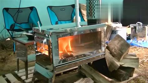 农民发明的新型取暖柴火炉，放上几根木材就能取暖一天，太节能了_腾讯视频
