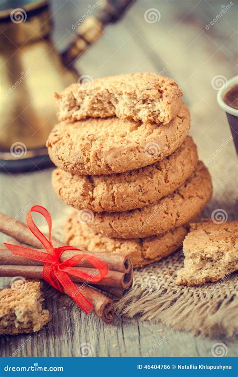 Homemade Oat Cookies, Cinnamon Sticks and Coffee Stock Photo - Image of ...