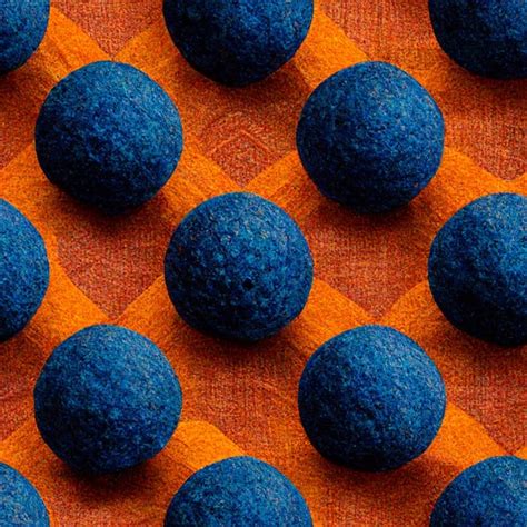 Un primer plano de bolas azules sobre un fondo naranja | Foto Premium