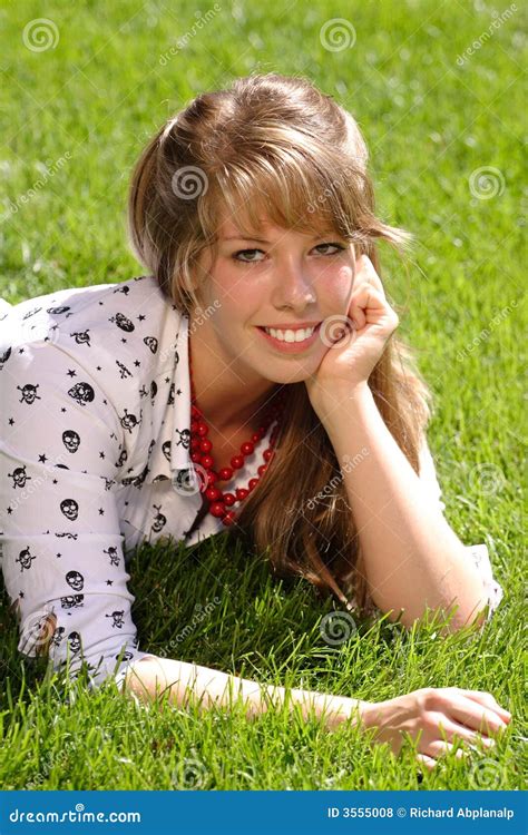 Pretty Teen Girl On Grass Royalty Free Stock Photos - Image: 3555008