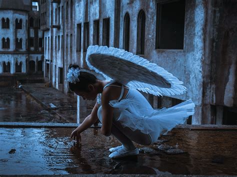 天使美女图片-天空中展开翅膀的天使美女素材-高清图片-摄影照片-寻图免费打包下载