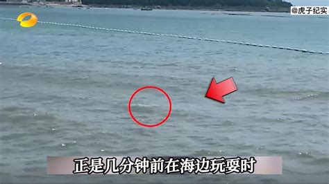 13岁男孩被浪卷走，岸边1000多人不敢下水，54岁大叔突然挺身而出_腾讯视频