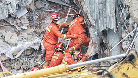 泉州酒店坍塌事故一对母子被埋52小时获救，仍有12人被困|界面新闻 · 中国