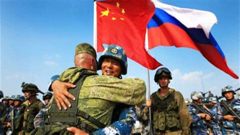 “西部·联合-2021”演习：中俄两军参演官兵接受沙场检阅_新闻频道_中国青年网